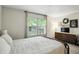 Bright bedroom features a serene view and modern media with space to unwind at 610 Front Royal Dr, Indianapolis, IN 46227