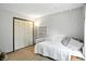 Cozy bedroom with closet, shelving, and soft carpet perfect for relaxation and storage at 610 Front Royal Dr, Indianapolis, IN 46227