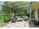 Cozy deck with pergola, outdoor seating, and stylish rug, perfect for relaxing at 610 Front Royal Dr, Indianapolis, IN 46227