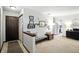 Spacious entryway featuring decor accents, a comfortable bench, and seamless access to the kitchen at 610 Front Royal Dr, Indianapolis, IN 46227