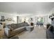 Open-concept living area boasting natural light, comfortable seating, and easy access to dining space at 610 Front Royal Dr, Indianapolis, IN 46227