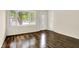 Bright living room with bay window, hardwood floors, and natural light at 6108 Penway St, Indianapolis, IN 46224