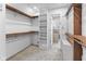 Organized walk-in closet with built-in shelving and ample storage space at 625 La Placita St, Greenwood, IN 46143