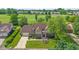 Aerial view of a well-maintained home with a lush green lawn, complementing its beautiful architecture at 625 La Placita St, Greenwood, IN 46143