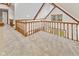 Hallway with vaulted ceilings, wood trim, and multiple windows offering abundant natural light at 625 La Placita St, Greenwood, IN 46143