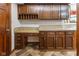 Kitchen with ample counterspace, upper and lower wood cabinets and custom flooring at 625 La Placita St, Greenwood, IN 46143