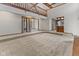 Large open living room with custom lighting and bar area at 625 La Placita St, Greenwood, IN 46143
