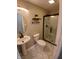 Bathroom features black fixtures, pedestal sink and glass shower stall at 6483 Timber Walk Dr, Indianapolis, IN 46236