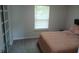 Comfortable bedroom featuring a window with natural light and neutral-toned walls, offering a serene atmosphere at 6483 Timber Walk Dr, Indianapolis, IN 46236