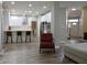 Open-concept living area with kitchen, dining, and living spaces featuring hardwood floors and ample natural light at 6483 Timber Walk Dr, Indianapolis, IN 46236