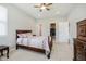 Spacious bedroom with neutral paint, carpet, and a decorative dark wood bedroom suite at 6644 Aberdeen Dr, McCordsville, IN 46055