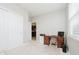 Office space featuring neutral carpet, a large desk, and a closet at 6644 Aberdeen Dr, McCordsville, IN 46055