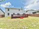 Spacious backyard with a well-maintained deck perfect for outdoor entertaining on a sunny day at 6839 Antelope Dr, Indianapolis, IN 46278
