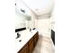 Bathroom featuring a double sink vanity, tile flooring, and a shower/tub combo at 6839 Antelope Dr, Indianapolis, IN 46278