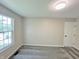 Bedroom featuring neutral walls, plush carpet flooring, a window offering plenty of natural light, and a closet at 6839 Antelope Dr, Indianapolis, IN 46278