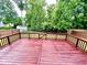 Spacious deck with stained wood, ideal for outdoor relaxation and entertaining, with a fenced backyard at 6839 Antelope Dr, Indianapolis, IN 46278