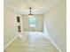 The dining area has hard surface floors and a modern chandelier at 6839 Antelope Dr, Indianapolis, IN 46278