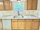 Kitchen featuring granite countertops, stainless steel sink and newer appliances at 6839 Antelope Dr, Indianapolis, IN 46278