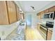 Modern kitchen boasts stainless steel appliances, granite counters and ample cabinet space at 6839 Antelope Dr, Indianapolis, IN 46278