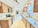 Well-lit kitchen with stainless steel appliances, granite countertops and subway tile backsplash at 6839 Antelope Dr, Indianapolis, IN 46278