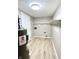 Large, dedicated laundry room with ample storage and modern flooring at 6839 Antelope Dr, Indianapolis, IN 46278