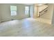 Spacious living room featuring new floors and natural light from two windows at 6839 Antelope Dr, Indianapolis, IN 46278