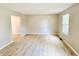 Bright, freshly painted living room with hard surface floors at 6839 Antelope Dr, Indianapolis, IN 46278