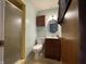 Cozy bathroom with a shower, vanity, and neutral color scheme at 7725 S Oak Dr, Indianapolis, IN 46227