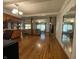 Spacious living room with hardwood floors, pillars, and abundant natural light at 7725 S Oak Dr, Indianapolis, IN 46227
