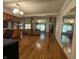 Spacious living room with hardwood floors, pillars, and abundant natural light at 7725 S Oak Dr, Indianapolis, IN 46227
