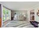Cozy living room with a comfortable sofa, natural light, and stylish decor at 8201 Castle Dr, Indianapolis, IN 46256