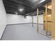 Unfinished basement with painted ceiling and walls, ready for customization and renovation projects at 8315 N Payne Rd, Indianapolis, IN 46268