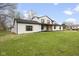 Beautifully renovated two-story home with a well-manicured lawn and striking curb appeal at 8315 N Payne Rd, Indianapolis, IN 46268