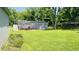 Photo of a well maintained backyard with a wooden deck in the back of the house at 8336 S Belmont Ave, Indianapolis, IN 46217
