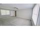 Living room with carpet, neutral paint, and ceiling fan at 8336 S Belmont Ave, Indianapolis, IN 46217