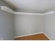 Neutral Living room with light wood flooring, neutral paint, and bright natural light for cozy living at 8336 S Belmont Ave, Indianapolis, IN 46217