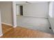 Spacious living room featuring new gray carpet, neutral wall color, and abundant natural light at 8336 S Belmont Ave, Indianapolis, IN 46217