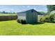 Exterior photo of a backyard shed with lots of lawn at 8336 S Belmont Ave, Indianapolis, IN 46217