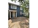 Charming two-story home with blue siding, white trim, and a welcoming front porch at 8434 Meadowlark Dr, Indianapolis, IN 46226