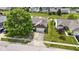 Aerial view of the home with a driveway, and pond in the backyard at 8778 N Deer Crossing Blvd, McCordsville, IN 46055