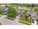 Aerial view of the home with a driveway, and pond in the backyard at 8778 N Deer Crossing Blvd, McCordsville, IN 46055