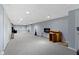 A large basement area featuring a neutral carpet, recessed lighting, and plenty of open space at 8778 N Deer Crossing Blvd, McCordsville, IN 46055