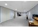Spacious basement area with neutral carpet and recessed lighting, ready for customization at 8778 N Deer Crossing Blvd, McCordsville, IN 46055