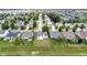 This aerial showcases the home’s neighborhood location, with mature trees & nearby community at 8778 N Deer Crossing Blvd, McCordsville, IN 46055