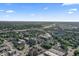 Wide aerial view of the city showing the green painted townhomes and surrounding buildings at 914 N Alabama St, Indianapolis, IN 46202