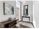Entryway with modern decor, chandelier lighting, and a large mirror at 914 N Alabama St, Indianapolis, IN 46202