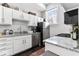 Efficient kitchen featuring granite countertops, stainless steel appliances, and ample cabinet space at 914 N Alabama St, Indianapolis, IN 46202