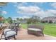 Inviting backyard deck offering ample seating and views of the lush, green yard at 1035 White Oak Dr, Plainfield, IN 46168