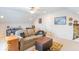 Bonus room featuring a comfortable couch, neutral carpet, and unique decor at 1035 White Oak Dr, Plainfield, IN 46168