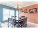 Inviting dining room with a stylish chandelier, and warm-colored walls creating a cozy atmosphere at 1035 White Oak Dr, Plainfield, IN 46168